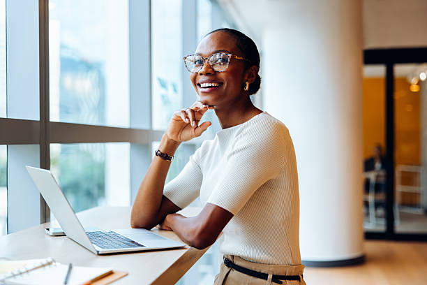 A professional smiling while planning her next career move